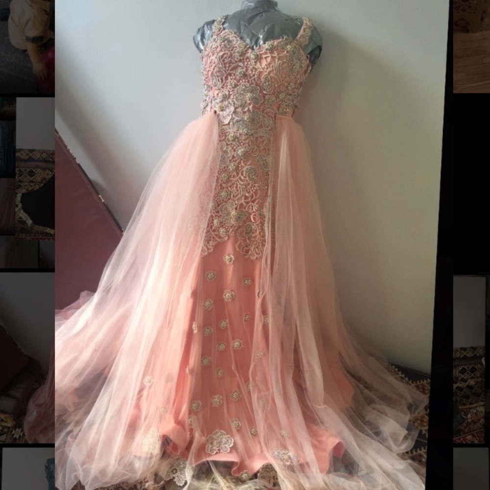 A very elegant dress with a long tail